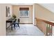 Bright hallway with a window and a desk, creating a functional and inviting workspace at 2136 S Scranton Way, Aurora, CO 80014
