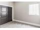 Bedroom with neutral paint, carpet, window and a large closet at 3255 S Birch St, Denver, CO 80222