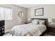 Inviting bedroom with a cozy bed, neutral decor, and ample natural light at 3255 S Birch St, Denver, CO 80222
