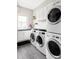 Well-organized laundry room with modern appliances and ample storage at 3255 S Birch St, Denver, CO 80222