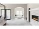 The view from the main bedroom includes a stylish living room with a modern fireplace at 3255 S Birch St, Denver, CO 80222