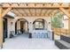 Outdoor patio with bar, seating, and lights at 3255 S Birch St, Denver, CO 80222