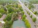 Aerial view showing home near a thoroughfare and shopping centers at 25 S Wadsworth Blvd, Lakewood, CO 80226