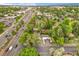 Aerial view of property adjacent to the thoroughfare, set among mature trees at 25 S Wadsworth Blvd, Lakewood, CO 80226