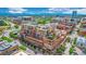 Wide aerial view of building, showcasing the city and mountain views at 1499 Blake St # 4F, Denver, CO 80202