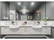 Chic bathroom boasting double sinks, designer fixtures, and stylish tile accents for a spa-like experience at 1499 Blake St # 4F, Denver, CO 80202