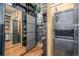 Spacious closet with built-in organizers and mirrored doors, offering ample storage and contemporary appeal at 1499 Blake St # 4F, Denver, CO 80202