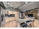 Modern kitchen featuring a granite island and stainless steel appliances at 1499 Blake St # 4F, Denver, CO 80202