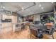 Open concept living area with kitchen, dining and living spaces with abundant light at 1499 Blake St # 4F, Denver, CO 80202