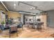 Open concept kitchen and dining area with bar stool seating, a table and 4 chairs at 1499 Blake St # 4F, Denver, CO 80202
