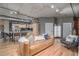 Open-concept living room with hardwood floors and modern decor at 1499 Blake St # 4F, Denver, CO 80202