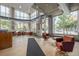 Bright, spacious lobby with large windows, seating, and stylish decor at 1499 Blake St # 4F, Denver, CO 80202