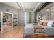 Main bedroom with hardwood floors and modern decor throughout the room at 1499 Blake St # 4F, Denver, CO 80202