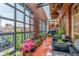 Comfortable patio with city views, seating, and potted plants for relaxing outdoors at 1499 Blake St # 4F, Denver, CO 80202