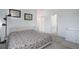 Bright bedroom boasts natural light, modern decor, and neutral color scheme at 8254 S Gaylord Cir, Centennial, CO 80122