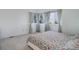 Bedroom with ample natural light with neutral walls and carpet flooring at 8254 S Gaylord Cir, Centennial, CO 80122