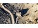 Overhead view of a secluded home, featuring a private driveway and natural landscape at 11730 Pointe View Dr, Longmont, CO 80503