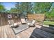 Spacious back deck with comfortable seating and decorative elements, perfect for outdoor relaxation and social gatherings at 7724 S Lafayette Ct, Centennial, CO 80122