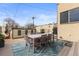 Backyard featuring an outdoor dining space on a deck with a built-in grill and manicured green space at 5 Harrison St, Denver, CO 80206