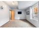 Cozy basement area with carpeting, perfect for lounging and recreation at 5 Harrison St, Denver, CO 80206