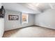 Carpeted basement with natural light, perfect for versatile use at 5 Harrison St, Denver, CO 80206