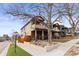 Attractive home with a stone facade and well-maintained front yard at 5 Harrison St, Denver, CO 80206