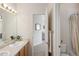 Cozy bathroom with a single sink vanity and tub/shower combo, offering a clean and functional space at 6290 Virgil St, Arvada, CO 80403