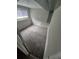 Finished basement features modern carpeting, a utility box, and a window at 3246 S Nucla St, Aurora, CO 80013
