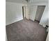 This bedroom offers neutral walls, and soft, gray carpeting to help create a serene space at 3246 S Nucla St, Aurora, CO 80013