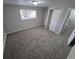 Bedroom with neutral walls, and large window for natural light at 3246 S Nucla St, Aurora, CO 80013
