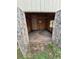 Storage shed interior with open double doors and plywood walls at 3246 S Nucla St, Aurora, CO 80013