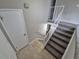 Staircase leading upstairs, featuring carpeted steps and modern railings at 3246 S Nucla St, Aurora, CO 80013