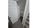 Under-stairs closet provides ample storage space, with a shelf and a hanging rod at 3246 S Nucla St, Aurora, CO 80013