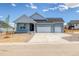 Charming single-Gathering home featuring a two-car garage and stylish architectural details at 39628 Yorktown Ter, Elizabeth, CO 80107