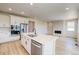 Bright, open-concept kitchen with stainless steel appliances and a view of the living area at 39628 Yorktown Ter, Elizabeth, CO 80107