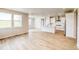 Bright, airy room with modern flooring and large windows offering scenic views at 39628 Yorktown Ter, Elizabeth, CO 80107