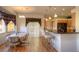 Bright kitchen with a breakfast bar, eat-in table, and stylish finishes at 698 Larimer Creek Dr, Monument, CO 80132