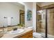Modern bathroom with stylish fixtures and glass shower at 13943 W 87Th Ln, Arvada, CO 80005