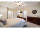 Main bedroom with attached bathroom and lots of natural light at 13943 W 87Th Ln, Arvada, CO 80005