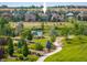 Picturesque green space featuring a gazebo, pond, and walking path, perfect for outdoor enjoyment at 13943 W 87Th Ln, Arvada, CO 80005