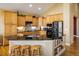 Gourmet kitchen features granite countertops, stainless steel appliances, and ample cabinet space at 13943 W 87Th Ln, Arvada, CO 80005