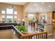 Open-concept living room features high ceilings, and lots of natural light at 13943 W 87Th Ln, Arvada, CO 80005