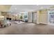 Large basement with full kitchen and sitting area with access to bathroom and large storage closet at 6307 S Gallup St, Littleton, CO 80120