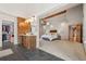 The spacious main bedroom with an attached en-suite bathroom and walk-in closet features vaulted ceilings and ample natural light at 6307 S Gallup St, Littleton, CO 80120