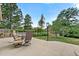 Inviting patio area with outdoor seating, perfect for relaxing and enjoying the landscaped backyard at 6307 S Gallup St, Littleton, CO 80120