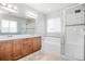 Elegant bathroom with a soaking tub, glass-enclosed shower, and double vanity sinks at 2028 Trail Stone Ct, Castle Rock, CO 80108