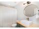 Stylish bathroom featuring a modern sink, elegant mirror, and a bright, airy ambiance at 2028 Trail Stone Ct, Castle Rock, CO 80108