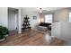 Cozy living room with wood floors, stylish decor, and lots of natural light at 2028 Trail Stone Ct, Castle Rock, CO 80108