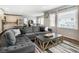 Comfortable living room with open layout to dining and kitchen at 2028 Trail Stone Ct, Castle Rock, CO 80108