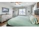 Inviting main bedroom with a bright ambiance, stylish decor, and ample closet space at 2028 Trail Stone Ct, Castle Rock, CO 80108